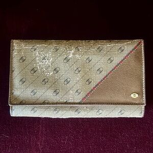 Vintage 1980’s Gucci Accessory collection trifold wallet.